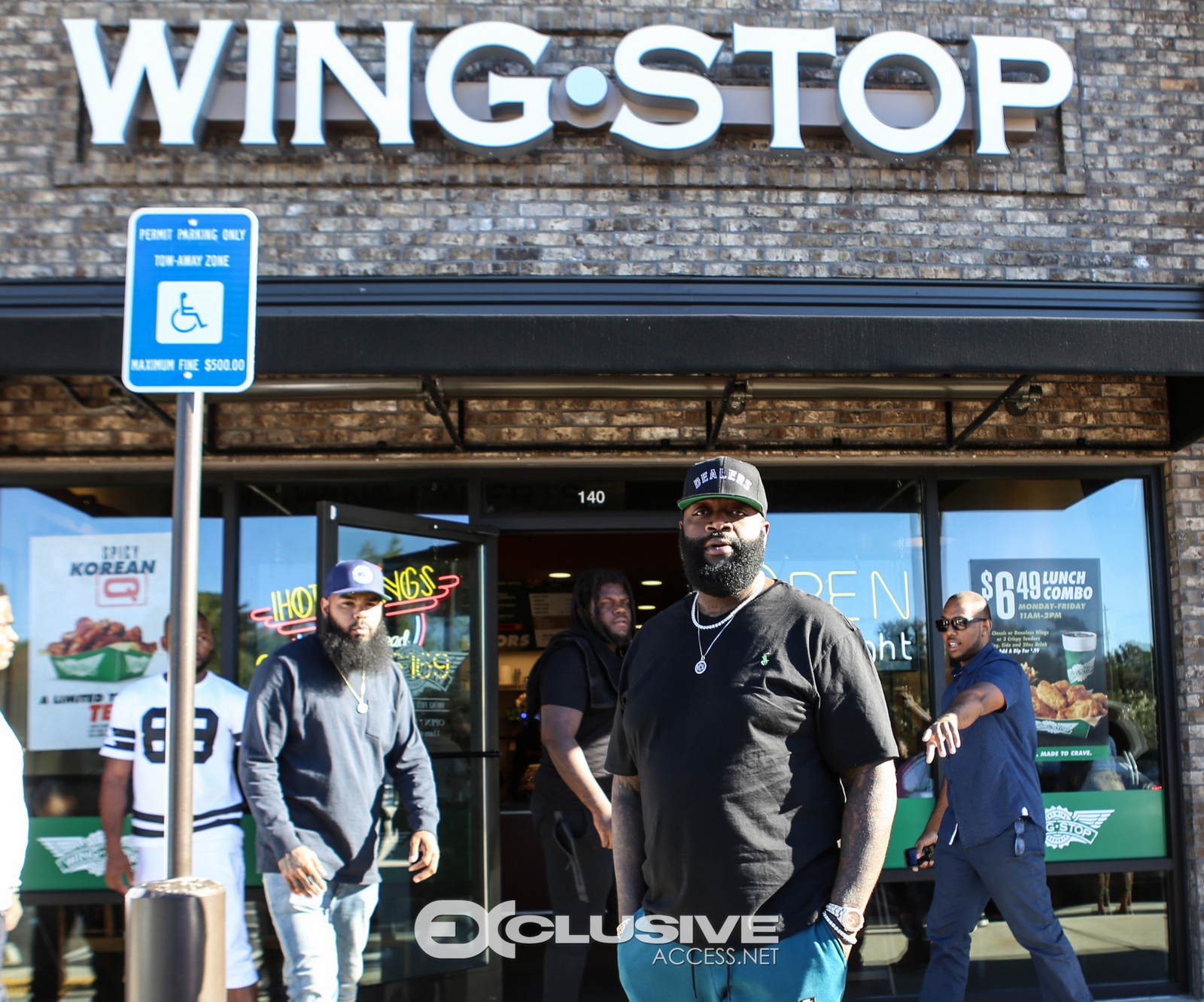 Rick Ross stops by his wingstop in Newnan