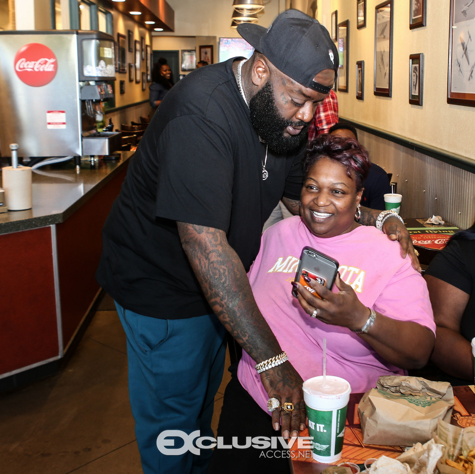 Rick Ross stops by his wingstop in Newnan