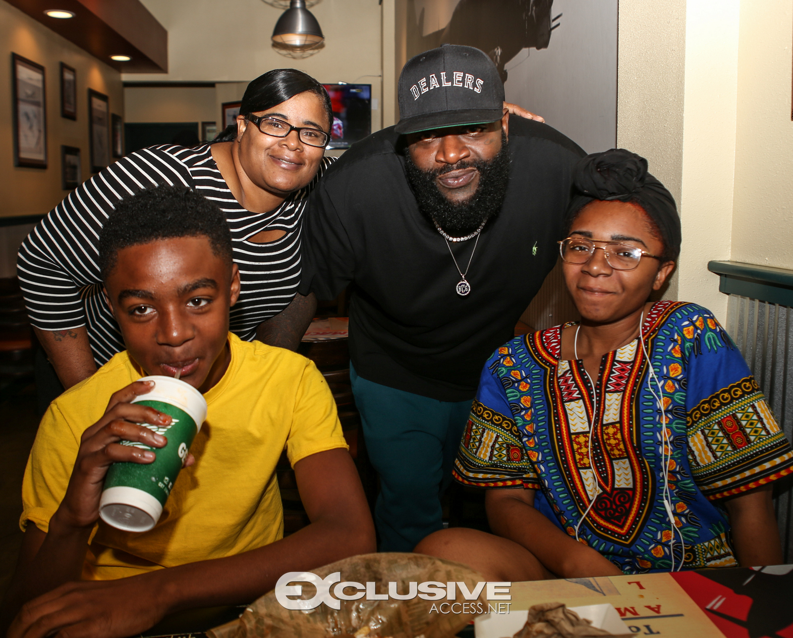 Rick Ross stops by his wingstop in Newnan