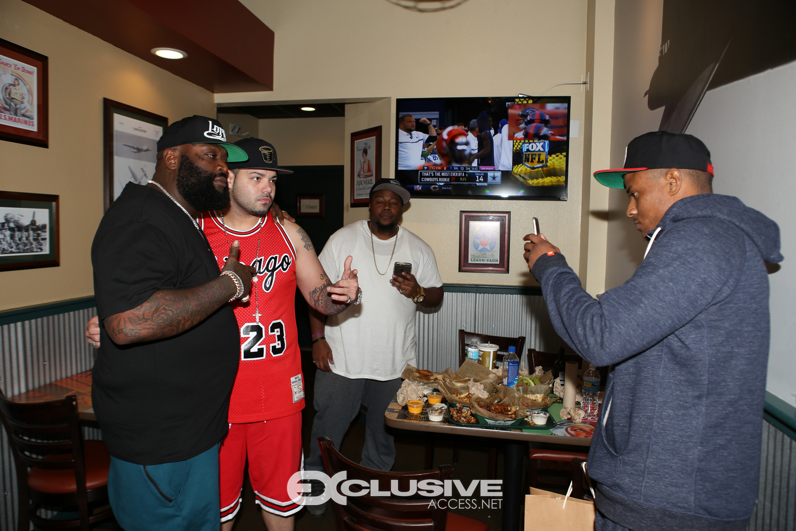 Rick Ross stops by his wingstop in Newnan