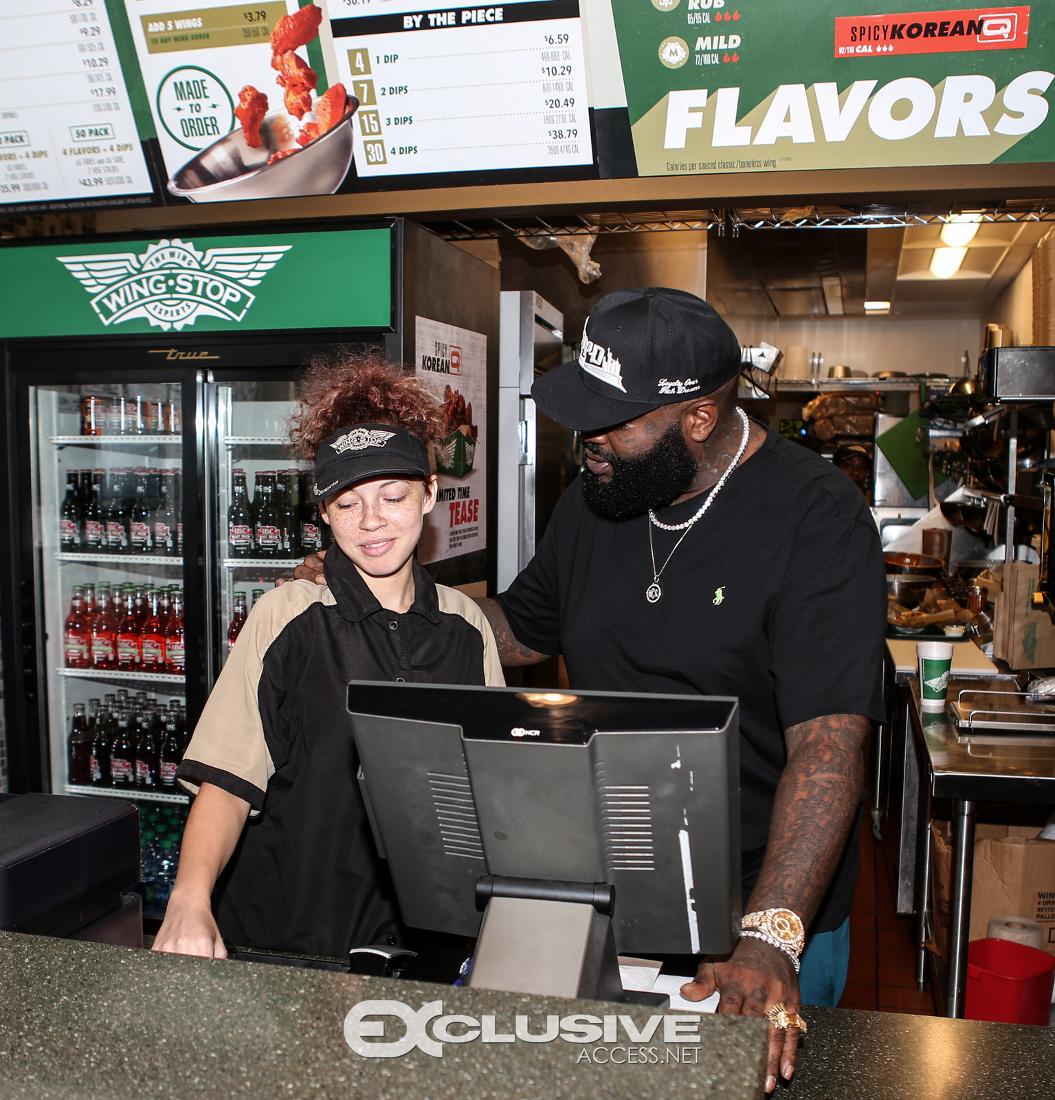 Rick Ross stops by his wingstop in Newnan