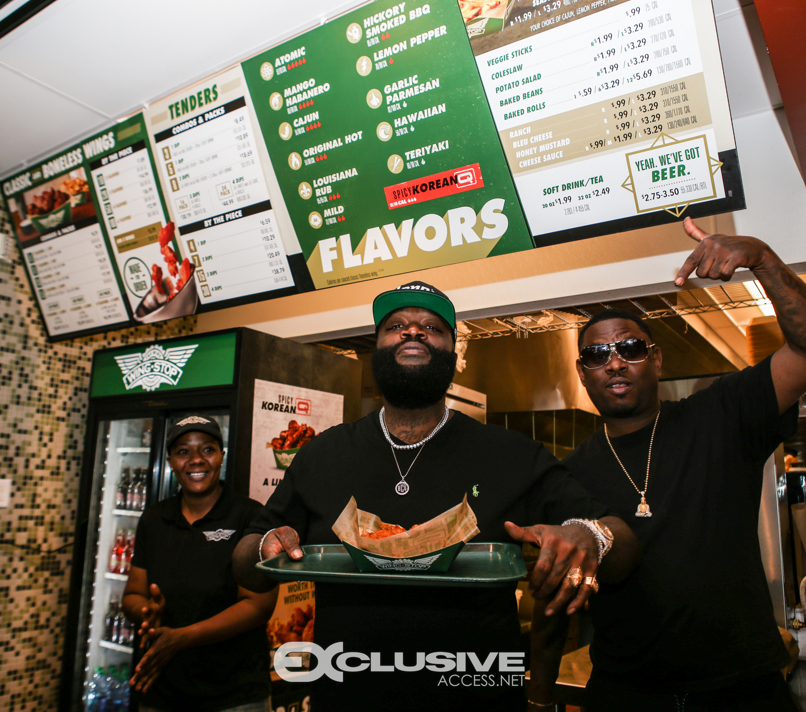 Rick Ross stops by his wingstop in Newnan