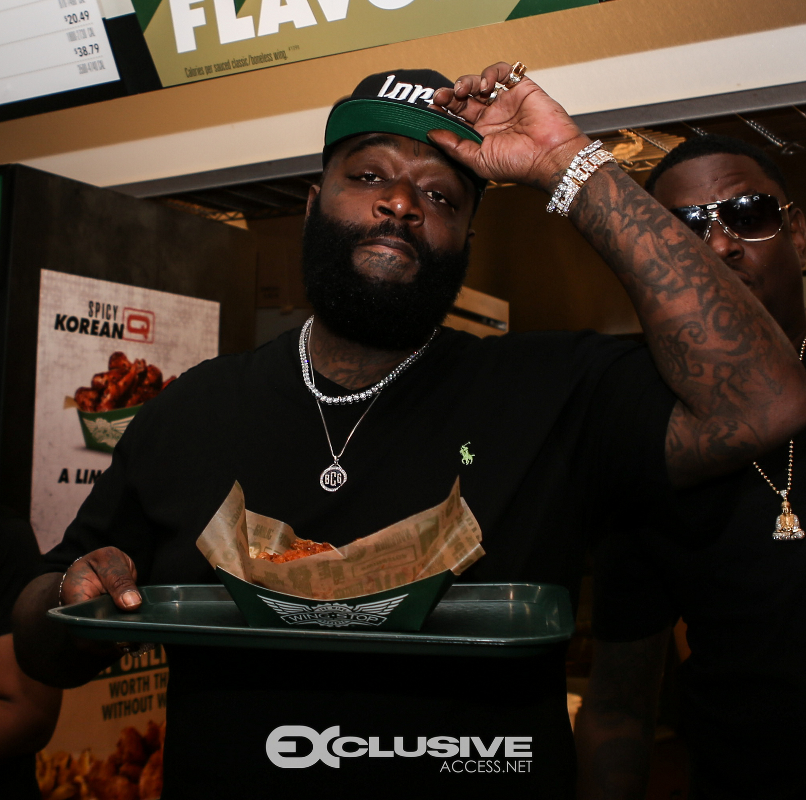 Rick Ross stops by his wingstop in Newnan