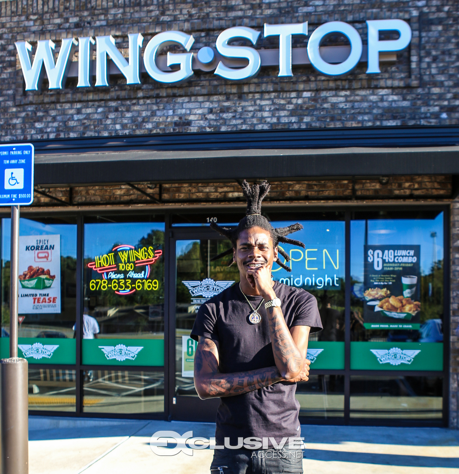 Rick Ross stops by his wingstop in Newnan