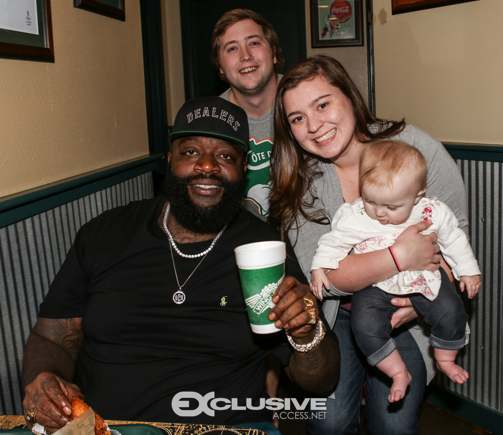 Rick Ross stops by his wingstop in Newnan