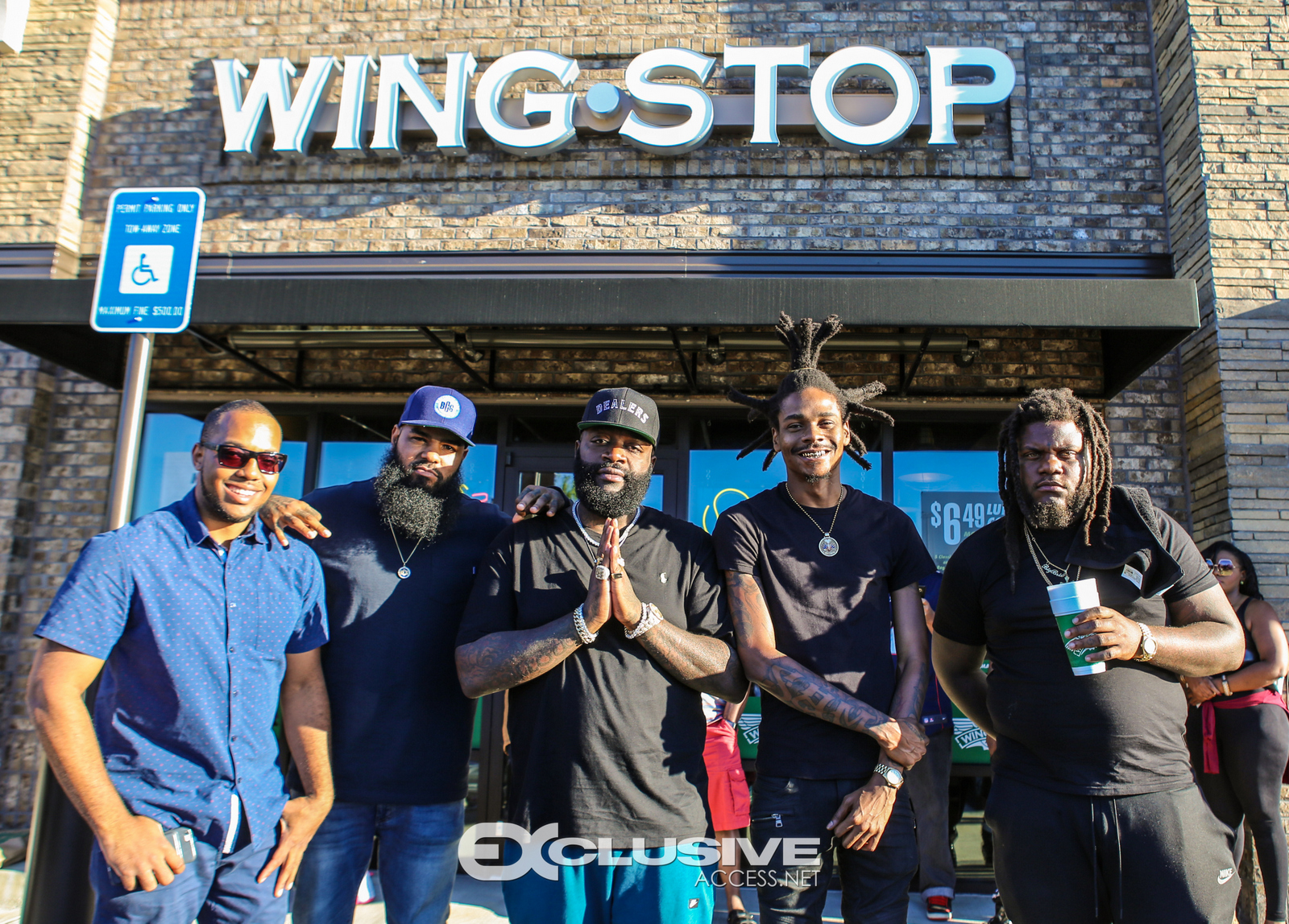 Rick Ross stops by his wingstop in Newnan