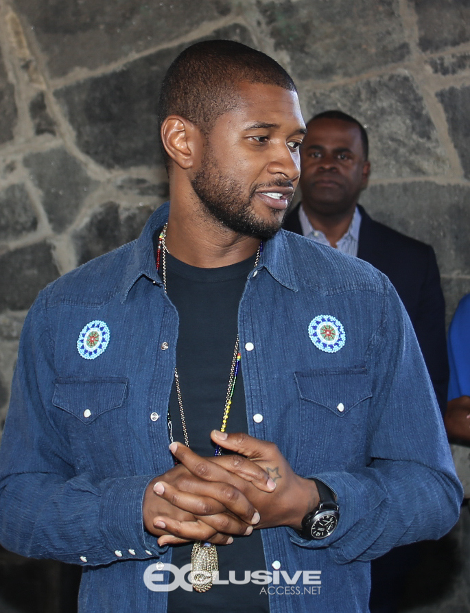 mayor-kasim-reed-and-usher-vote-in-fulton-county-photos-by-thaddaeus-mcadams-31-of-60