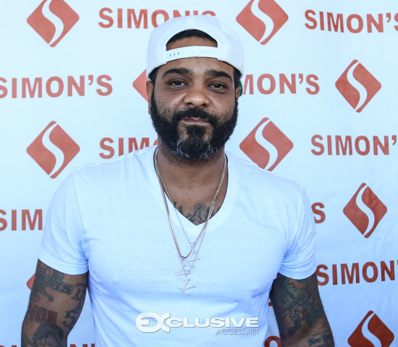jim-jones-pulls-up-and-gives-out-over-150-turkeys-in-the-hood-photos-by-thaddaeus-mcadams-exclusiveaccess-net-15-of-28