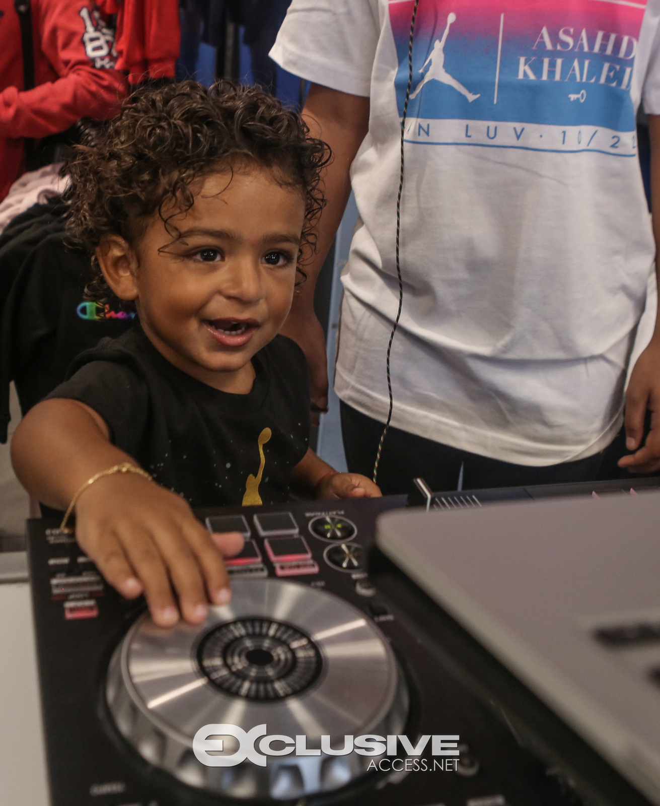 DJ & Asahad Khaled #FanLove at KIds Footlocker photos by Thaddaeus McAdams - ExclusiveAccess