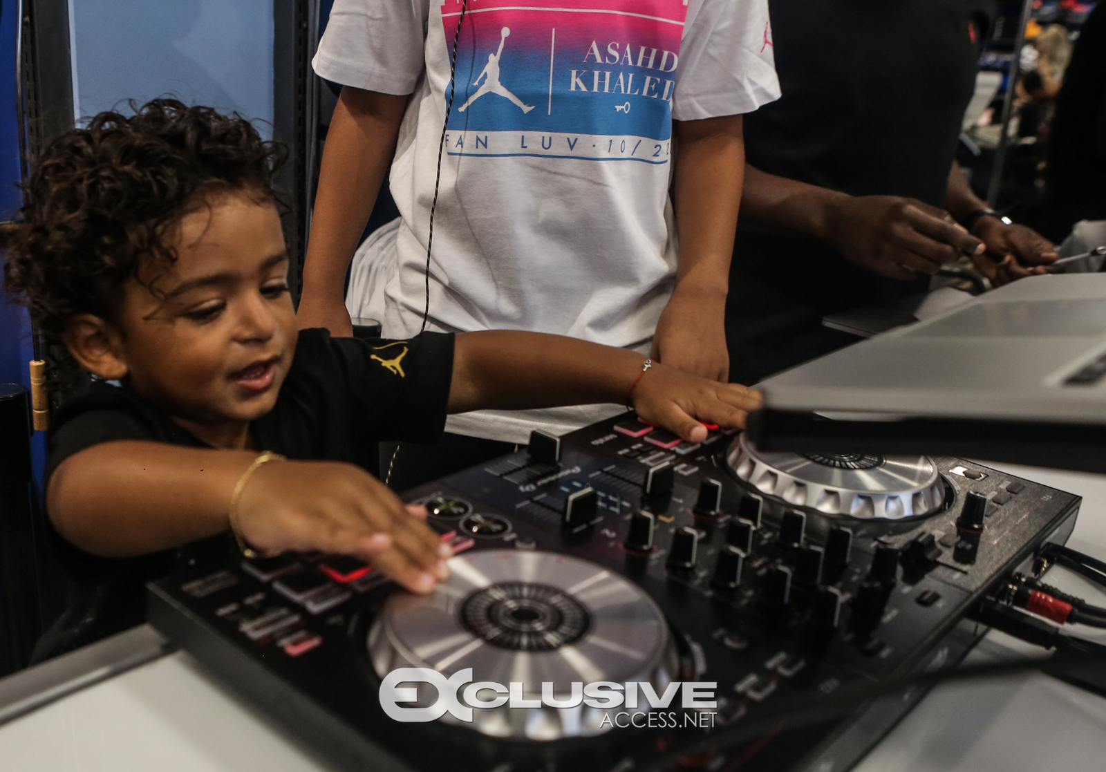 DJ & Asahad Khaled #FanLove at KIds Footlocker photos by Thaddaeus McAdams - ExclusiveAccess