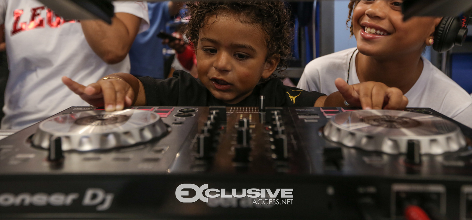 DJ & Asahad Khaled #FanLove at KIds Footlocker photos by Thaddaeus McAdams - ExclusiveAccess