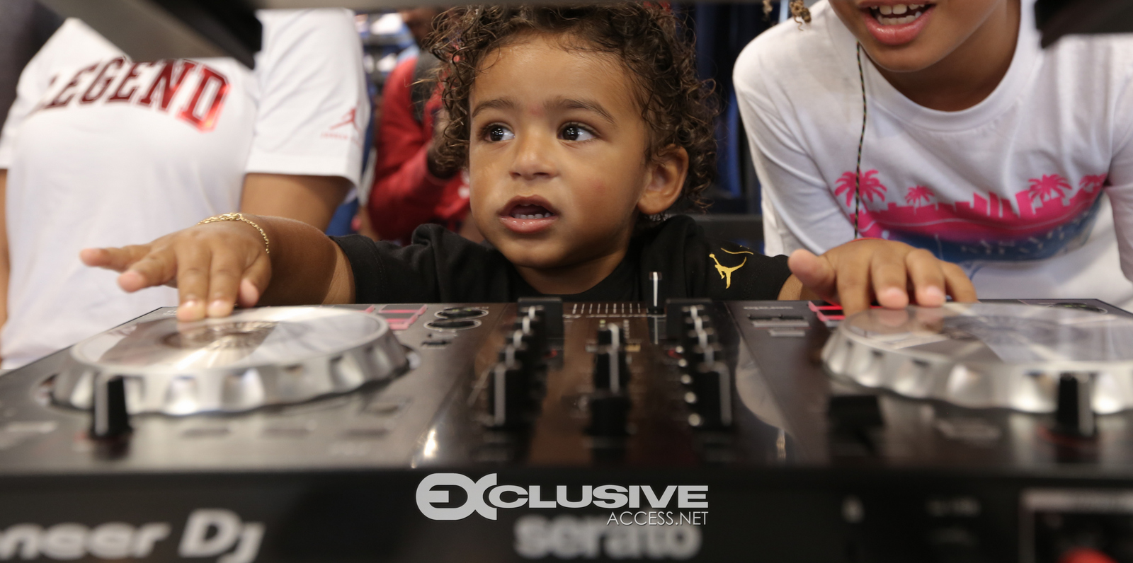 DJ & Asahad Khaled #FanLove at KIds Footlocker photos by Thaddaeus McAdams - ExclusiveAccess