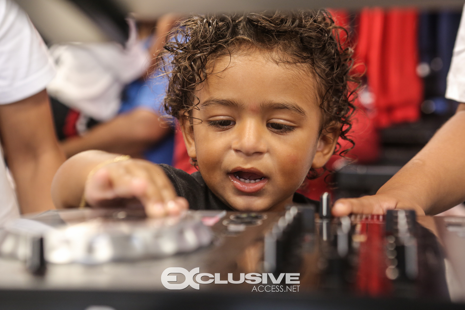 DJ & Asahad Khaled #FanLove at KIds Footlocker photos by Thaddaeus McAdams - ExclusiveAccess