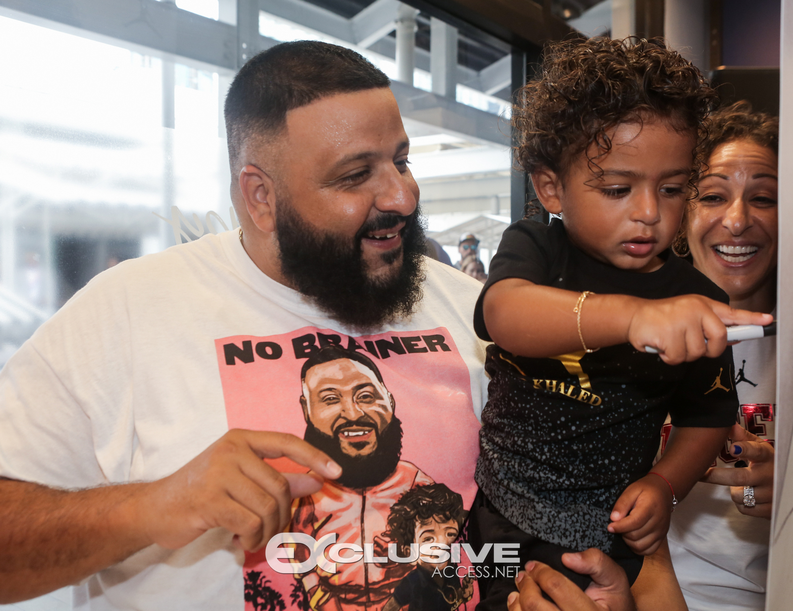 DJ & Asahad Khaled #FanLove at KIds Footlocker photos by Thaddaeus McAdams - ExclusiveAccess